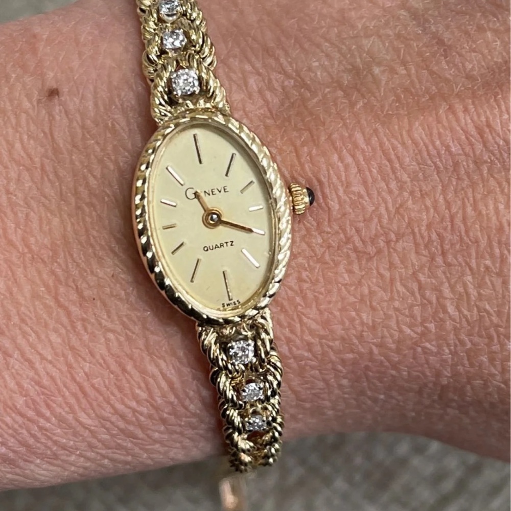 14k gold and Diamond watch